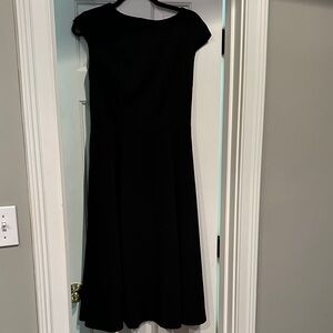 Dress Tells size medium Elegant Black Women's Dress.  Great condition